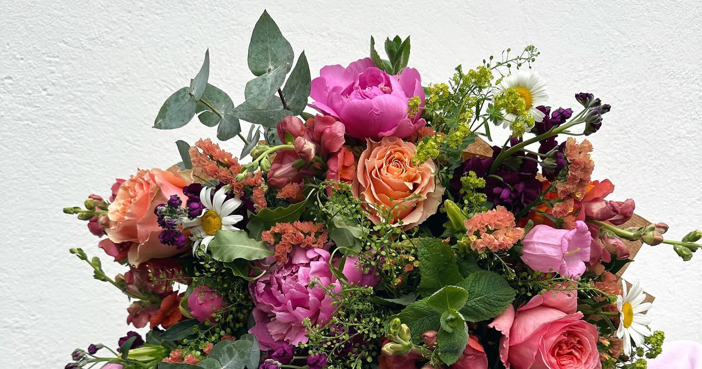 Bouquet of colorful flowers against a light background